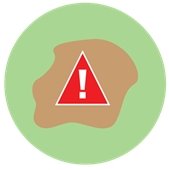 Warning symbol over soil, representing wastewater or septic system risks and environmental concerns.