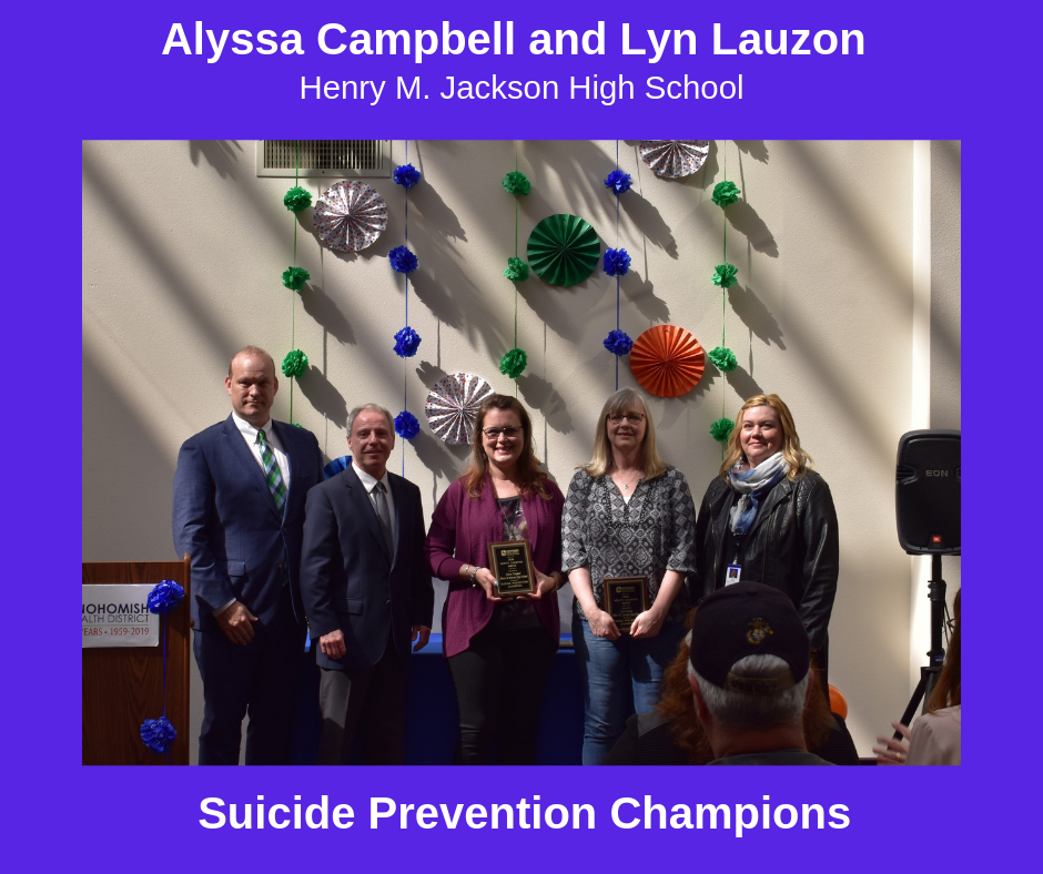 Lyn and Alyssa in a posed photo receiving their Health Champions award