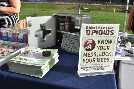 Resource table at Overdose Prevention Night