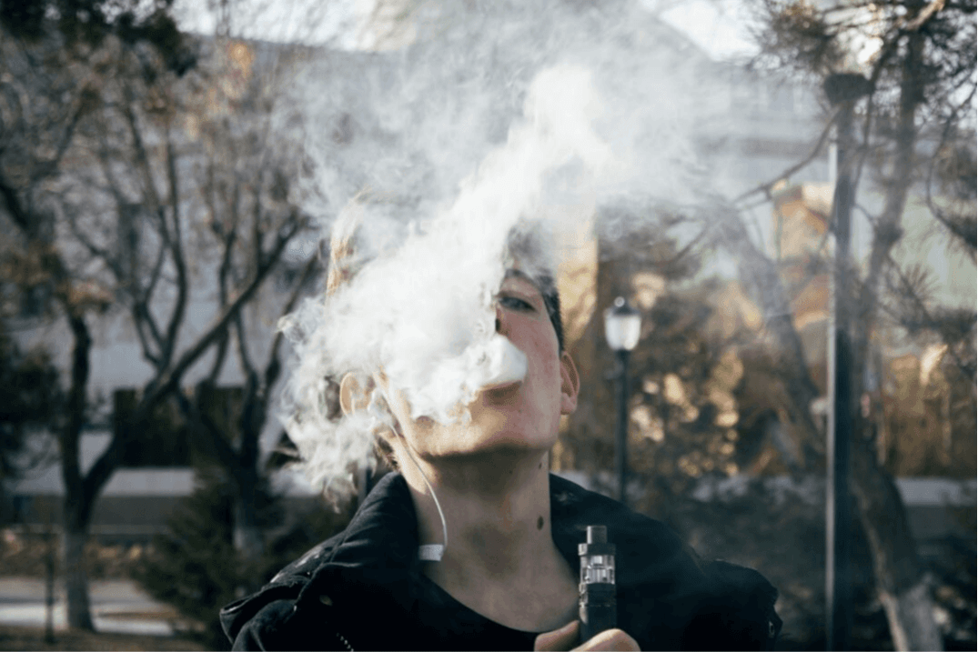 Person using vapor device